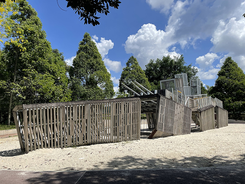 view of an empty battleship playground structure on a sunny day