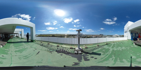 coin-operated binoculars on observation platform overlooking Kadena Air Base flightline